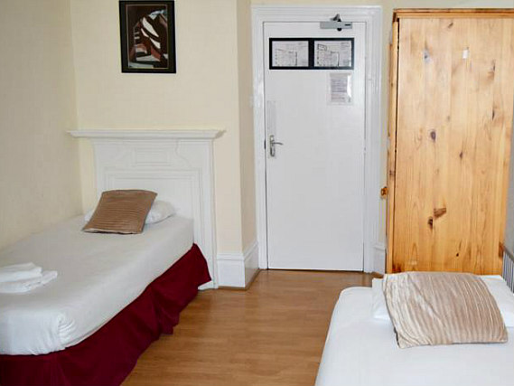 A twin room at Black Lion Guesthouse London is perfect for two guests