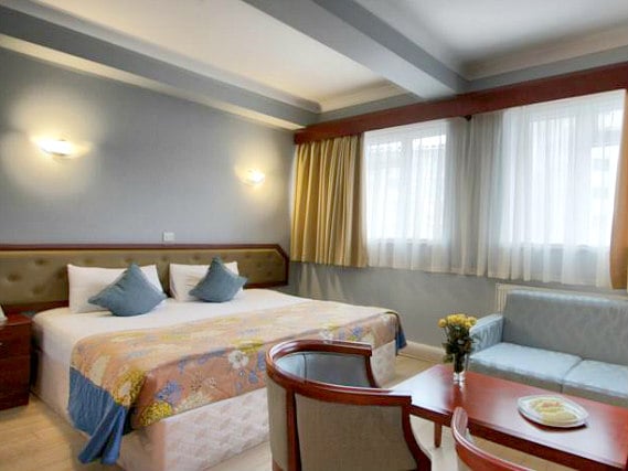 Get a good night's sleep in your comfortable room at St Georgio Hotel