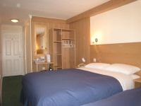 A quad room at West Cromwell Hotel, London