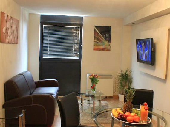 Relax after a hard day's sightseeing in the comfy living space at So London Apartments