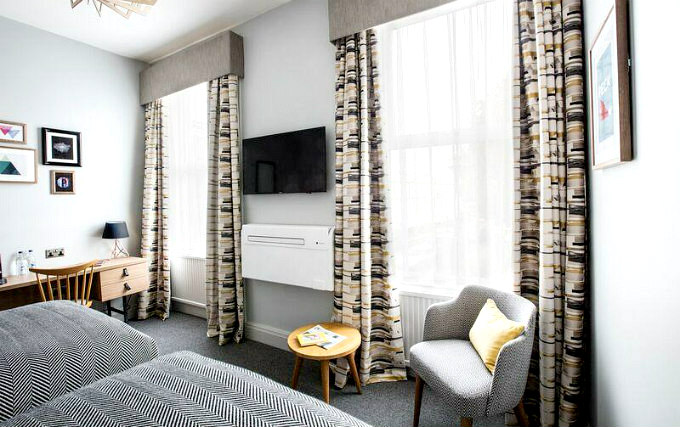 A twin room at Wishing Well Inn London
