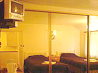 One of the twin rooms at Revive Lodge Heathrow