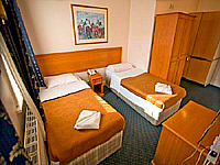 A twin room at 109 Warwick House Studios - all rooms feature private bathrooms and a kitchenette