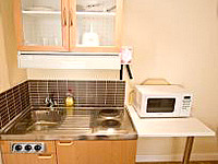 Each room contains convenient kitchenette facilities