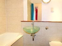 Bathrooms are stylish and modern at Access Apartments City