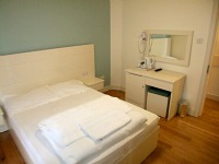 A typical double room at the The London Pembury Hotel