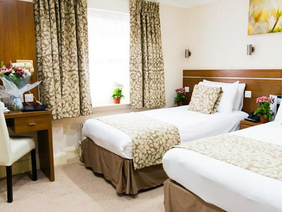 A twin room at Bayswater Inn is perfect for two guests