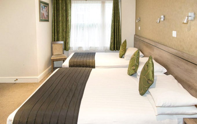 A typical triple room at Kensington Garden Hotel