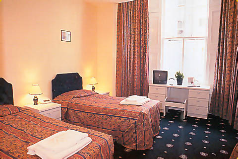 A twin room at Westbury Kensington Hotel