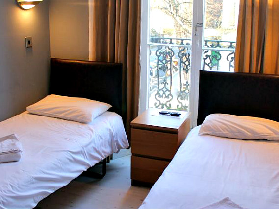 A twin room at New Dawn Hotel London