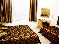 A superior triple room at the Russell Court Hotel