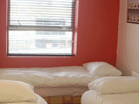 A typical triple room at Pay and Sleep Hotel
