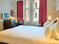 A Typical Example of a Bedroom at Shaftesbury Piccadilly Hotel