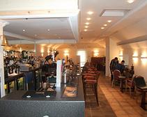 Alpine Lodge reception, with a bar and cafe