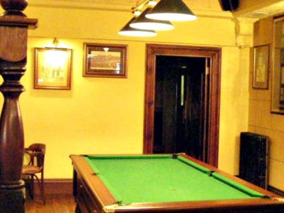 Join the locals with a game of pool