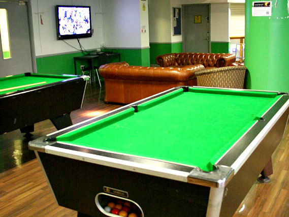 Common room with pool table and lounge