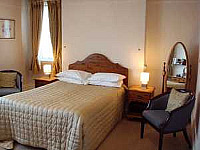 An elegantly furnished double room at the Best Inn Hotel