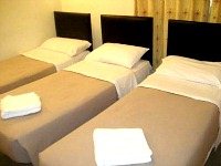Triple room at Holland Court Hotel
