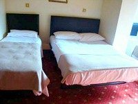 Triple room at Holland Court Hotel