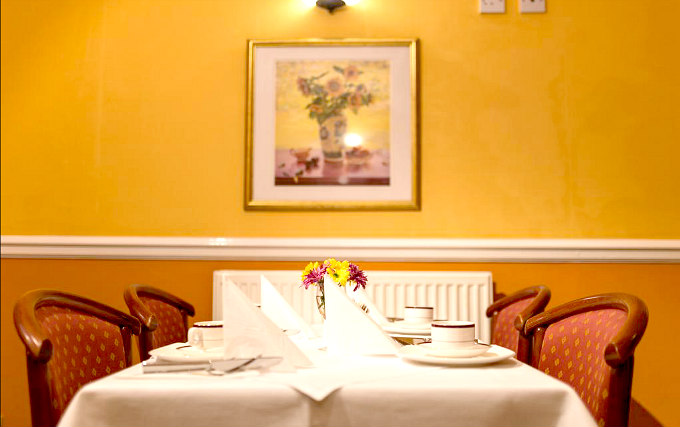 Relax and enjoy your meal in the Dining room at Victor Hotel London Victoria