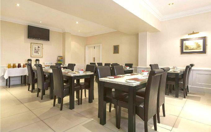 Relax and enjoy your meal in the Dining room at Ramada by Wyndham Crawley Gatwick