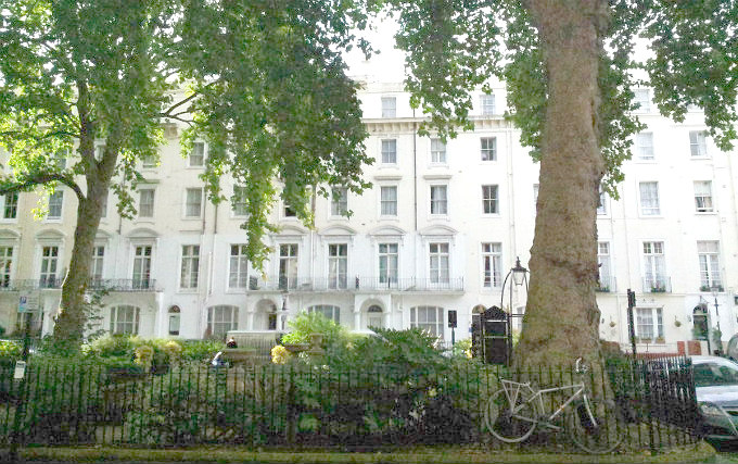 The attractive gardens and exterior of Continental Hotel London