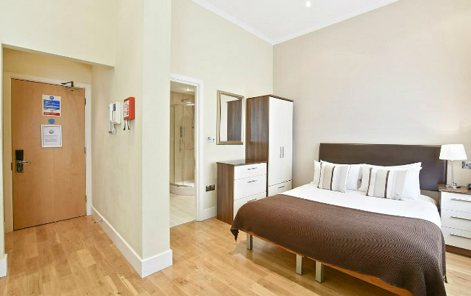 A comfortable double room at Somerset Princes Square Apartments
