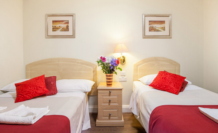 A twin room at Fairway Hotel London is perfect for two guests