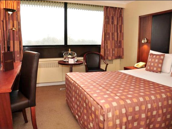 Get a good night's sleep in your comfortable room at Muthu Glasgow River Hotel