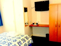 Feel right at home in this cosy single room Heathrow Lodge single room