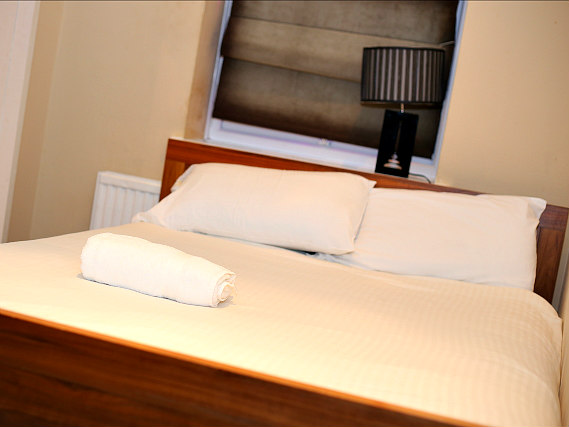 Get a good night's sleep in your comfortable room at Bull and Bush Hotel