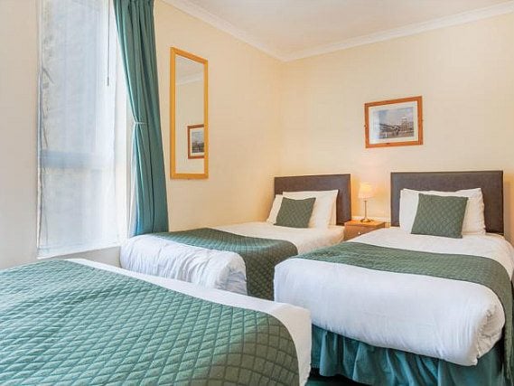 Enjoy plenty of space and comfort in your well priced triple share room