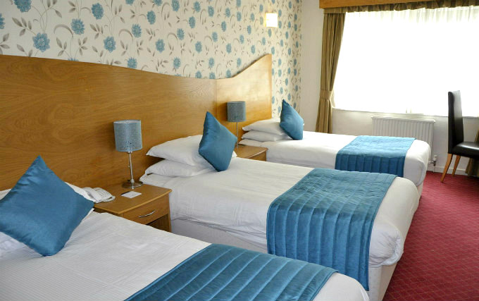 A typical triple room at Kensington Court Hotel