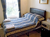 A comfortable double ensuite room at Holland Inn Hotel