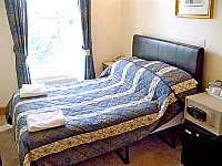 A comfortable double ensuite room at Holland Inn Hotel