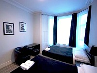 A Typical Triple Room at The Comfotel