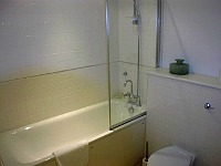 Bathrooms are modern and fresh at Groveland Court Superior Apartments
