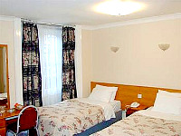 A Typical Twin Room at Belmont and Astoria Hotel