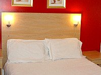 A double bed at the City Inn Express