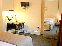 Wszystkie pokoje w Redland House Hotel są gustownie udekorowane. 