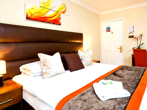 Rest easy in a comfortable bed in your room