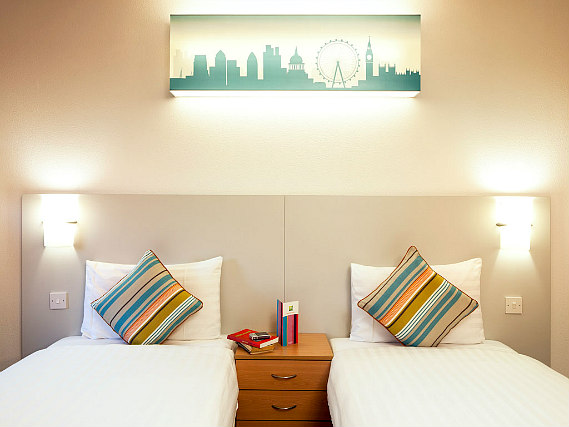 A twin room at Custom House Hotel is perfect for two guests