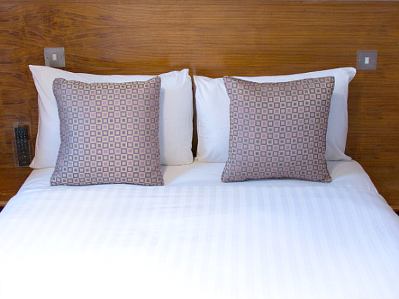 Put your feet up in front of the TV in your room