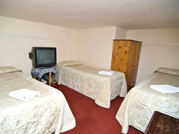 Put your feet up in front of the TV in your room