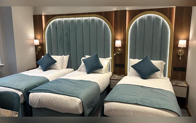 A typical triple room at St Mark Hotel London