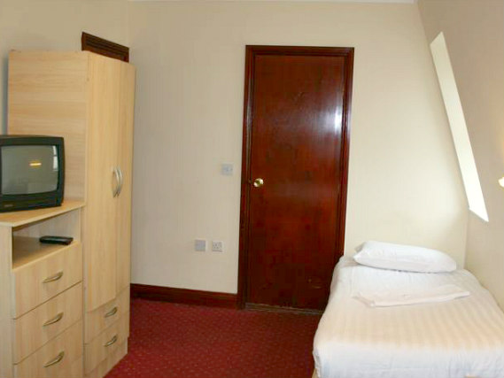 Ein Einzelzimmer im Hotel Olympia