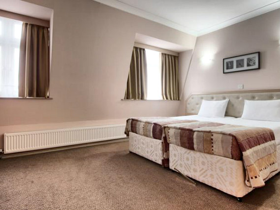 A twin room is perfect for two guests at St Georgio Hotel