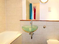 Bathrooms are stylish and modern at Access Apartments City