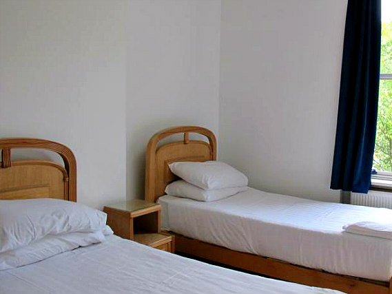 A twin room at Access Apartments Earls Court