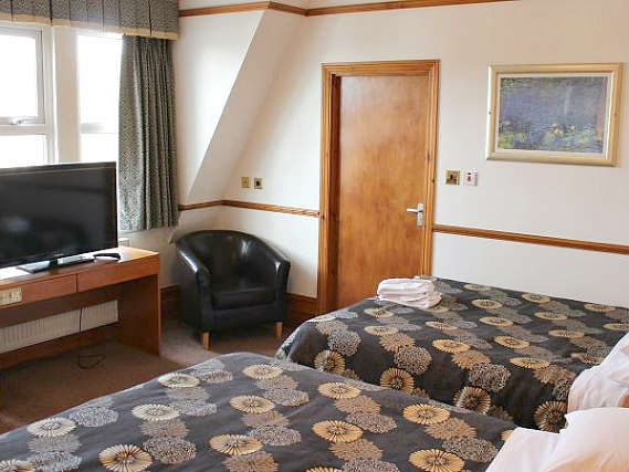 Put your feet up in front of the TV in your room